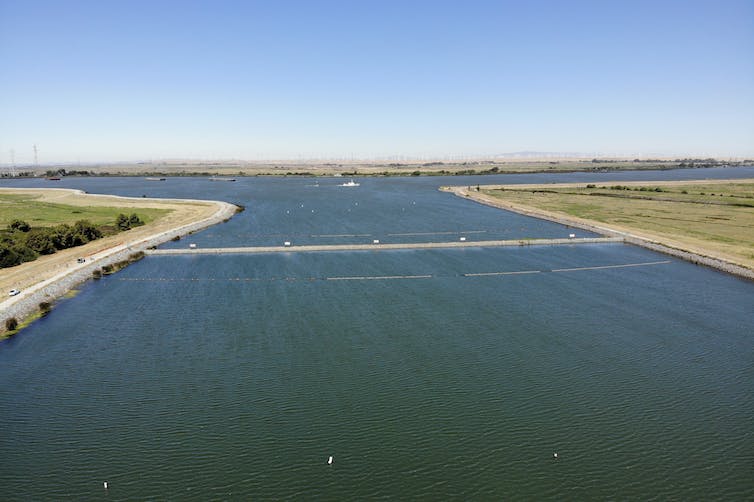 In 2022, California built an emergency drought barrier across the West False River near Oakley to protect against saltwater intrusion. AP Photo/Terry Chea