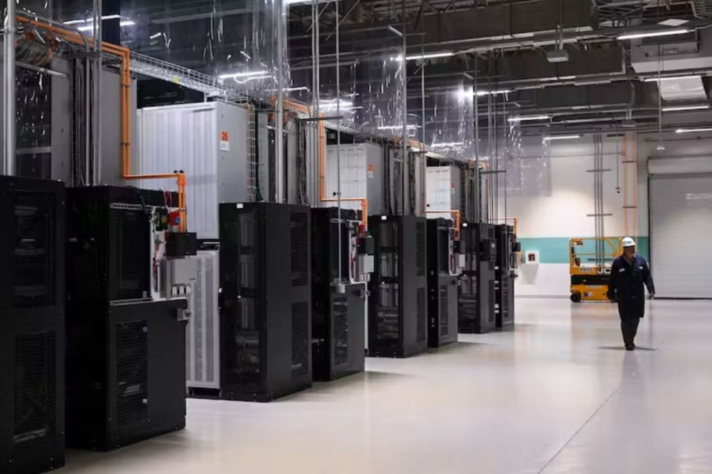 A large-scale battery storage system in Long Beach, Calif., provides renewable electricity during peak demand periods. Patrick T. Fallon/AFP via Getty Images